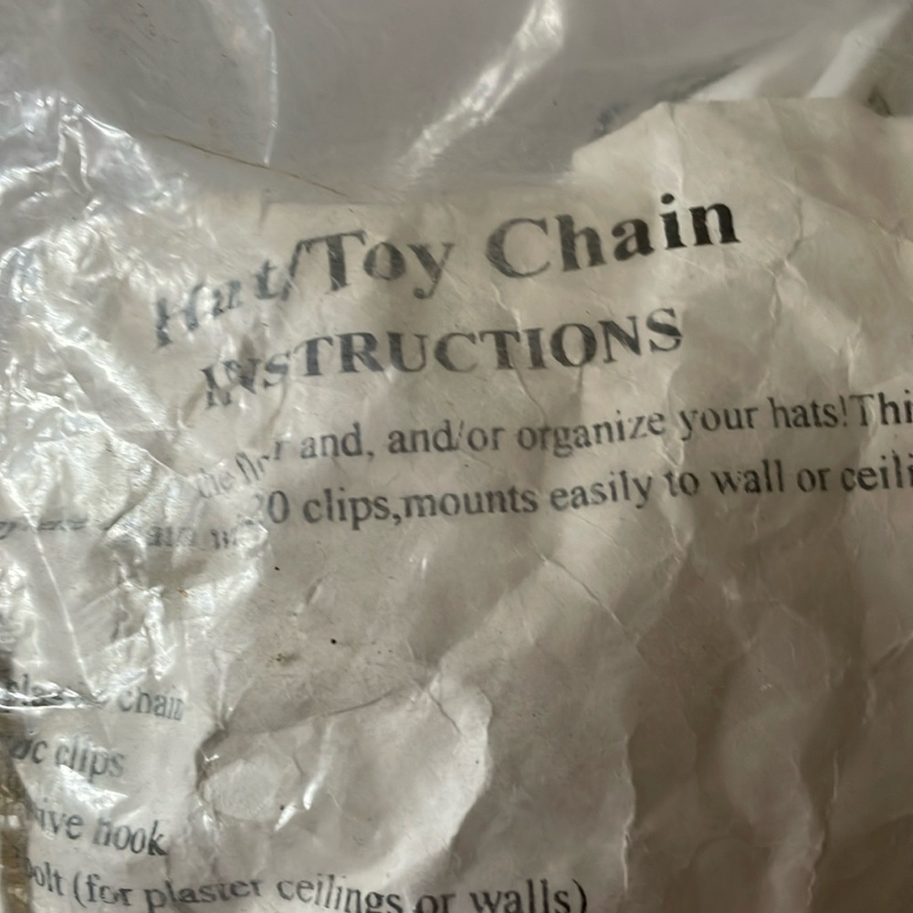 White plastic toy and hat chain brand new